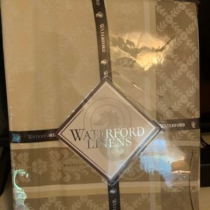 Waterford Linens 70”x 126”tabelcloth. Taupe  in color. Style pattern is Wyman